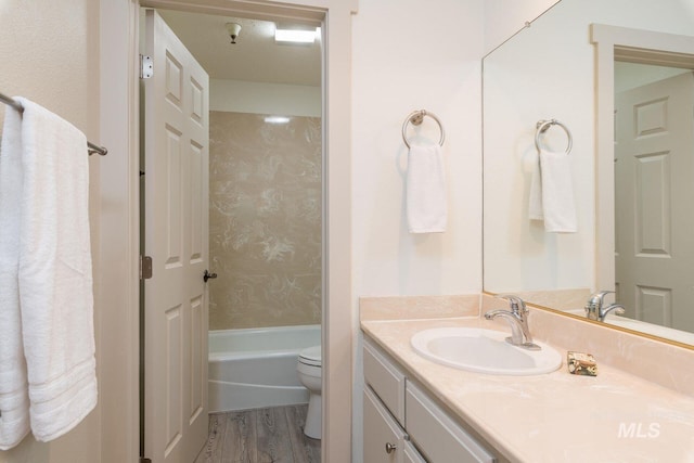 351 S 2nd Ave Unit 602, Ketchum, ID 83340 - bathroom with vanity, wood finished floors, and washtub / shower combination
