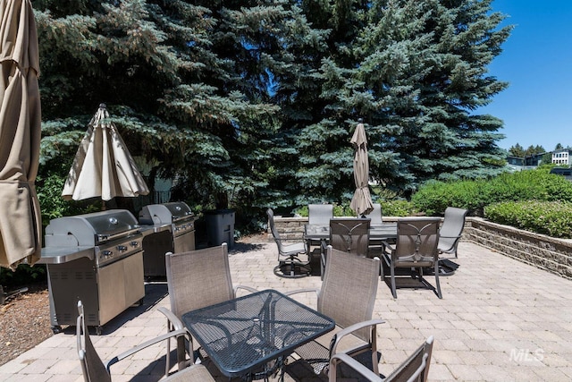 351 S 2nd Ave Unit 602, Ketchum, ID 83340 - view of patio / terrace with outdoor dining space and area for grilling