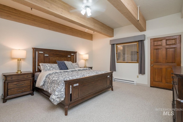 351 S 2nd Ave Unit 602, Ketchum, ID 83340 - bedroom featuring beamed ceiling, light colored carpet, a baseboard heating unit, and a ceiling fan