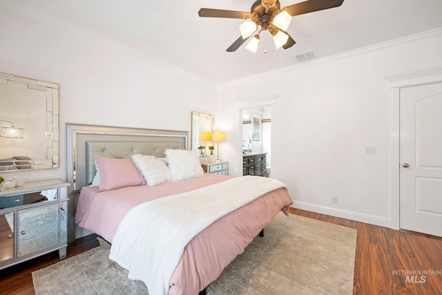 bedroom with baseboards, visible vents, wood finished floors, ceiling fan, and ornamental molding