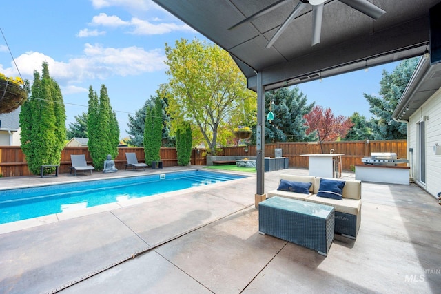 view of swimming pool with a patio area, a fenced backyard, and area for grilling