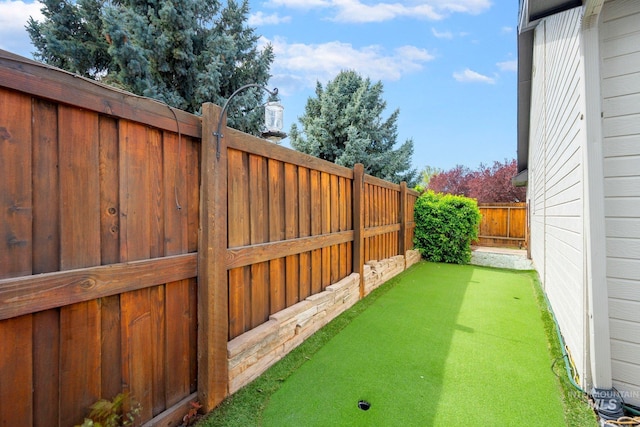 view of yard featuring fence