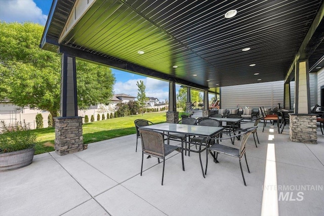 view of patio featuring outdoor dining space