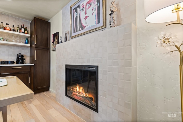2402 Columbus, Boise, ID 83705 - living room featuring light wood-style floors and a glass covered fireplace