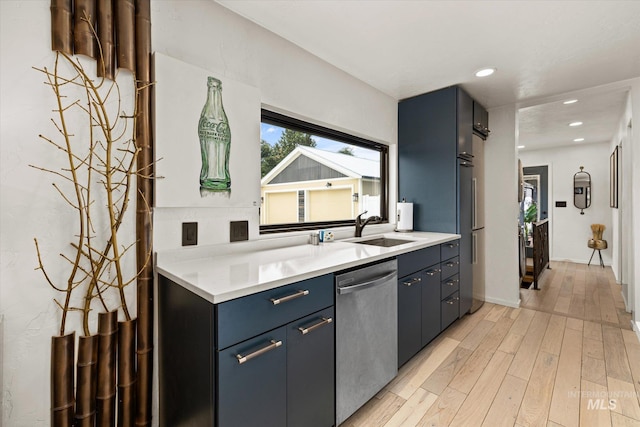 2402 Columbus, Boise, ID 83705 - kitchen featuring dishwasher, a sink, light wood-style floors, light countertops, and recessed lighting