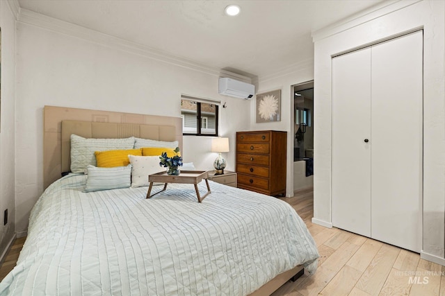 2402 Columbus, Boise, ID 83705 - bedroom with a wall mounted air conditioner, light wood-style flooring, ornamental molding, a closet, and recessed lighting