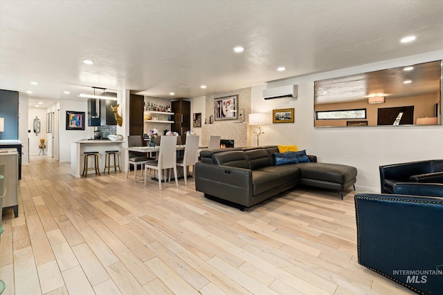 2402 Columbus, Boise, ID 83705 - living room with light wood-type flooring, a wall unit AC, and recessed lighting
