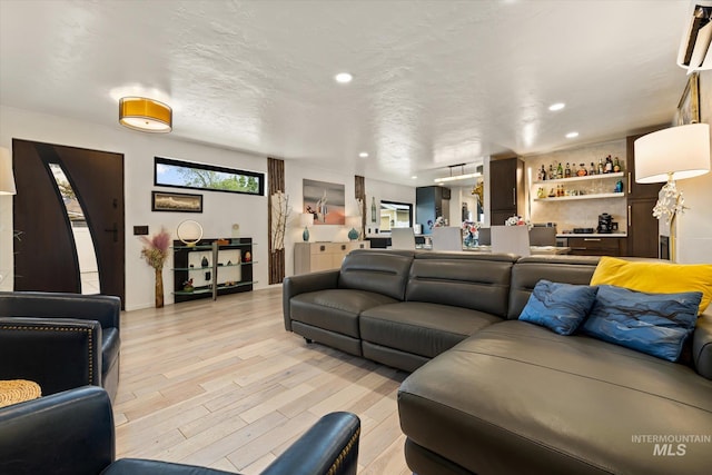 2402 Columbus, Boise, ID 83705 - living area featuring a bar, light wood finished floors, and recessed lighting