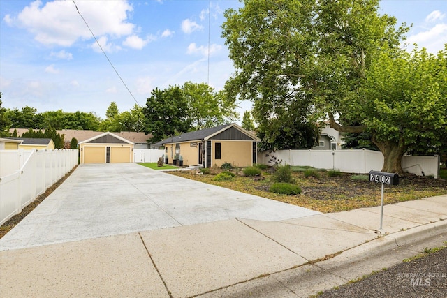 2402 Columbus, Boise, ID 83705 - ranch-style house with a detached garage and a residential view