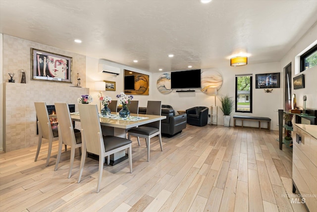 2402 Columbus, Boise, ID 83705 - dining space with a wall unit AC, light wood-type flooring, and recessed lighting