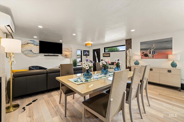 2402 Columbus, Boise, ID 83705 - dining space with a wall mounted air conditioner, light wood-style floors, and recessed lighting