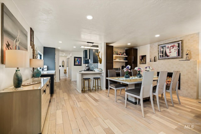 2402 Columbus, Boise, ID 83705 - dining area featuring light wood-style floors and recessed lighting