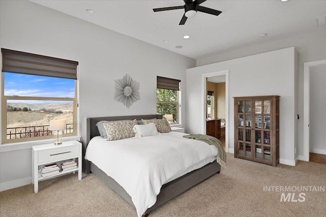 bedroom featuring ceiling fan, visible vents, baseboards, and carpet flooring