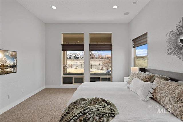 bedroom featuring carpet floors, recessed lighting, and baseboards