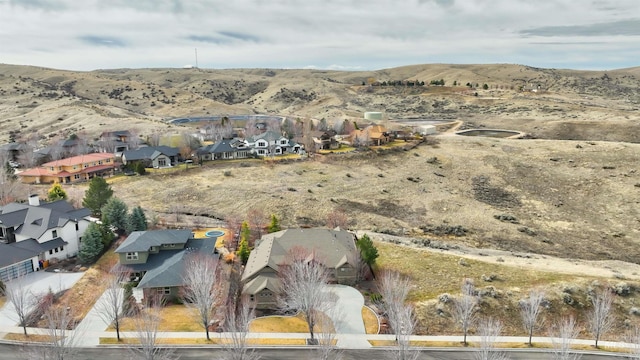 aerial view featuring a mountain view and a residential view