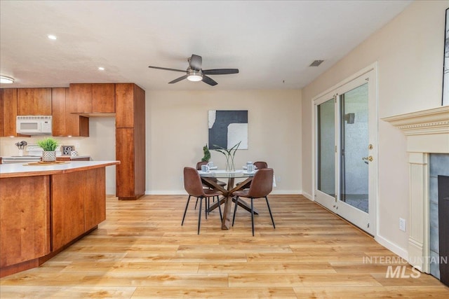 1134 N Camelot Dr, Boise, ID 83704 - dining room with light wood-style floors, recessed lighting, and ceiling fan