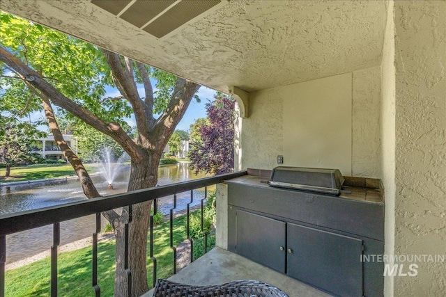 1134 N Camelot Dr, Boise, ID 83704 - balcony featuring a water view and grilling area
