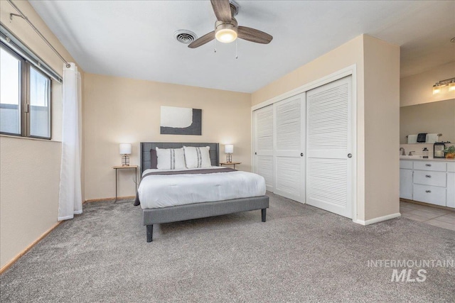 1134 N Camelot Dr, Boise, ID 83704 - bedroom with carpet flooring, a closet, and ceiling fan