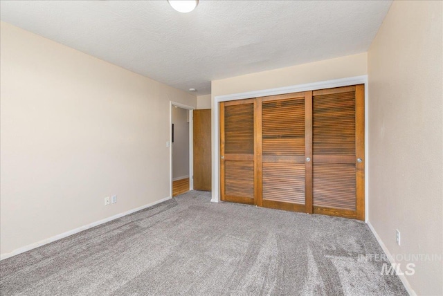 1134 N Camelot Dr, Boise, ID 83704 - unfurnished bedroom featuring a closet and carpet flooring