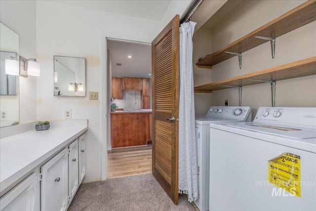 1134 N Camelot Dr, Boise, ID 83704 - laundry room with light colored carpet, washing machine and clothes dryer, and recessed lighting