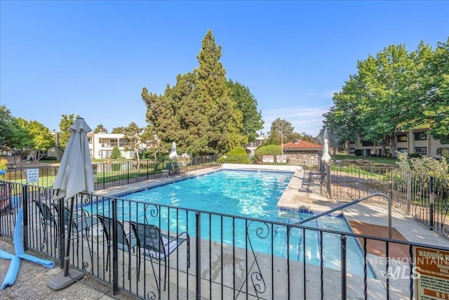 1134 N Camelot Dr, Boise, ID 83704 - community pool featuring a patio