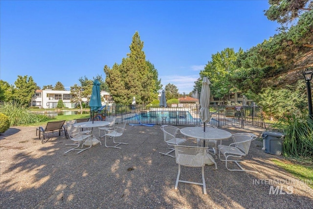 1134 N Camelot Dr, Boise, ID 83704 - view of swimming pool featuring a patio