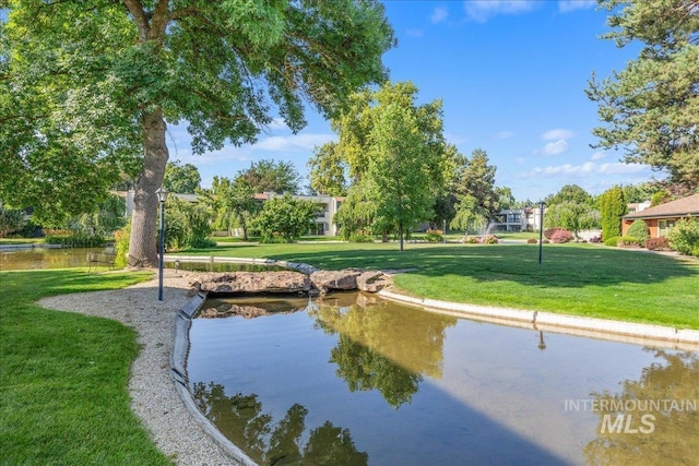 1134 N Camelot Dr, Boise, ID 83704 - view of home's community with a yard