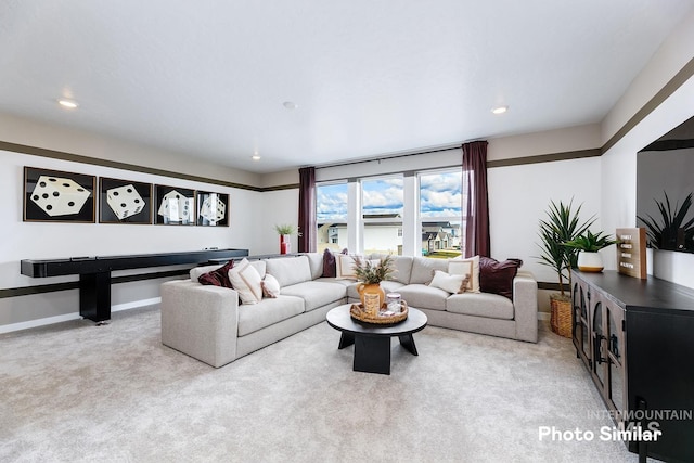 living area with recessed lighting, carpet, and baseboards