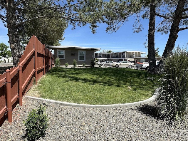 view of yard with fence