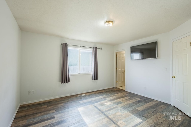 4709 Pioneer Ave, Caldwell, ID 83607 - unfurnished room with wood finished floors and baseboards
