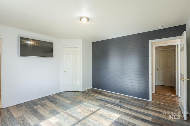 4709 Pioneer Ave, Caldwell, ID 83607 - unfurnished room featuring wood finished floors and baseboards