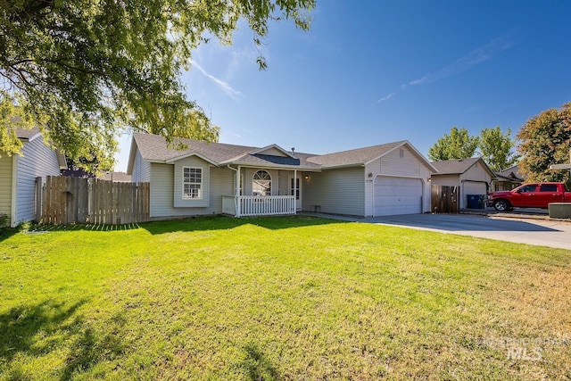 4709 Pioneer Ave, Caldwell, ID 83607 - ranch-style house with driveway, an attached garage, covered porch, and roof with shingles