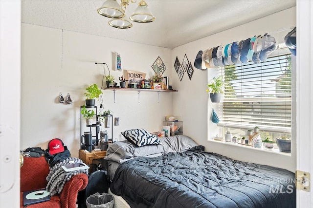 3012 Myrtlewood Way, Nampa, ID 83686 - bedroom with a chandelier and multiple windows