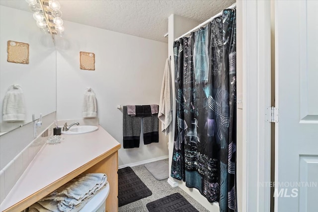 3012 Myrtlewood Way, Nampa, ID 83686 - bathroom with vanity and a textured ceiling