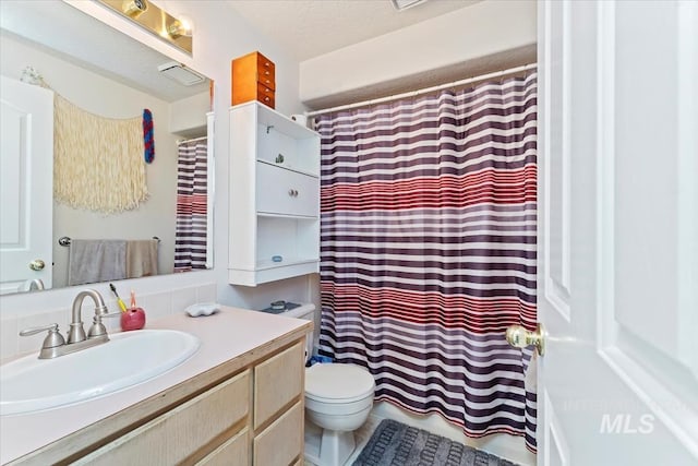 3012 Myrtlewood Way, Nampa, ID 83686 - bathroom with vanity, toilet, and curtained shower