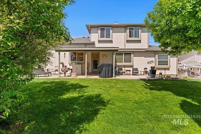 3012 Myrtlewood Way, Nampa, ID 83686 - back of property with a patio and a lawn
