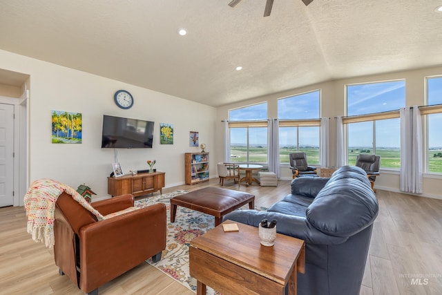 8142 US Highway 95, Marsing, ID 83639 - living area featuring plenty of natural light, recessed lighting, a textured ceiling, ceiling fan, and light wood-style floors