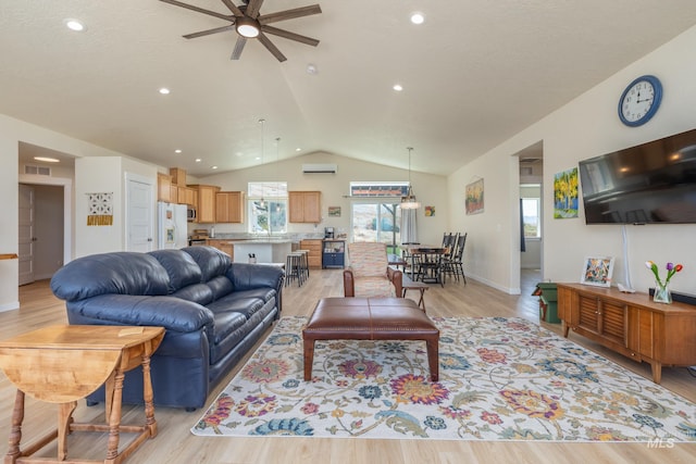 8142 US Highway 95, Marsing, ID 83639 - living area with ceiling fan, light wood-style floors, lofted ceiling, plenty of natural light, and baseboards