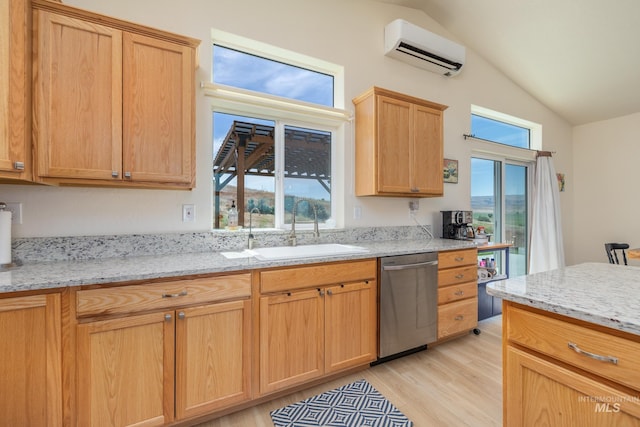 8142 US Highway 95, Marsing, ID 83639 - kitchen featuring stainless steel dishwasher, a sink, lofted ceiling, a wall unit AC, and light wood-style floors