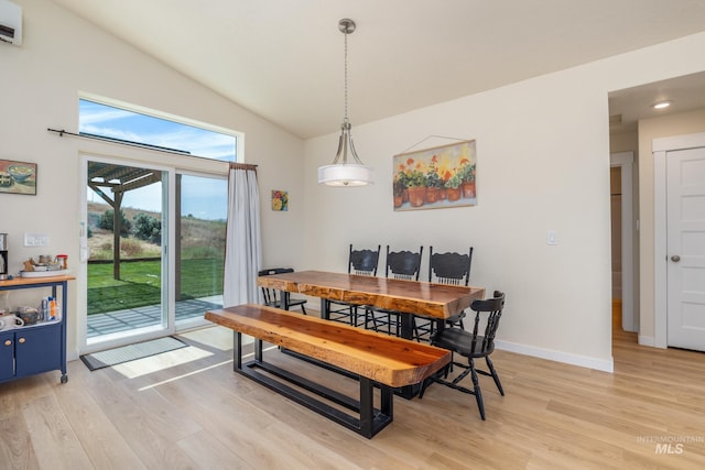 8142 US Highway 95, Marsing, ID 83639 - dining space with light wood-style floors, lofted ceiling, and baseboards
