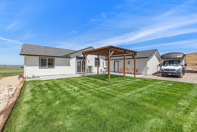 8142 US Highway 95, Marsing, ID 83639 - back of property with a pergola, a lawn, a patio, and roof with shingles
