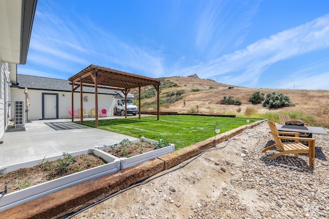 8142 US Highway 95, Marsing, ID 83639 - view of grassy yard with a patio and an outdoor fire pit