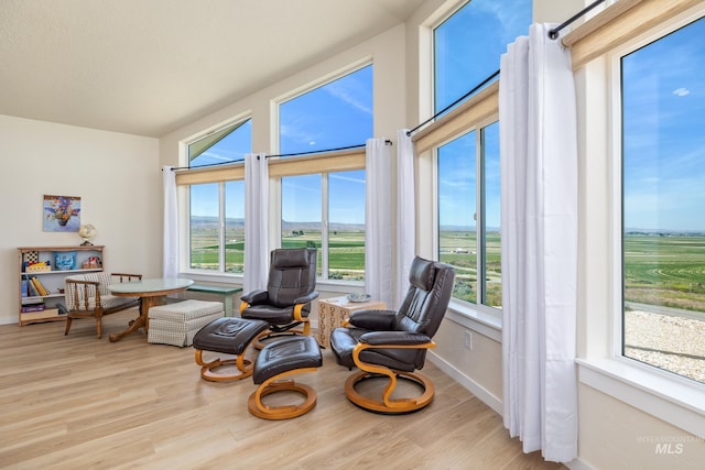 8142 US Highway 95, Marsing, ID 83639 - living area with healthy amount of natural light, baseboards, and wood finished floors