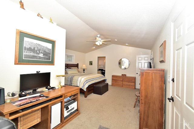 carpeted bedroom with vaulted ceiling and ceiling fan