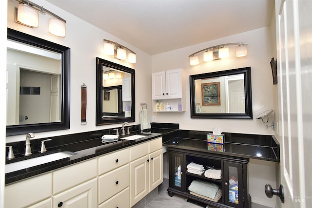 bathroom featuring vanity and tile patterned floors