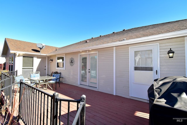 wooden deck featuring grilling area