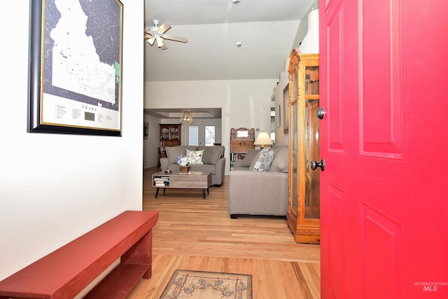 entryway featuring french doors, ceiling fan, and light wood-type flooring