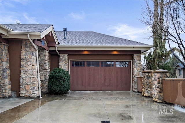 garage featuring driveway