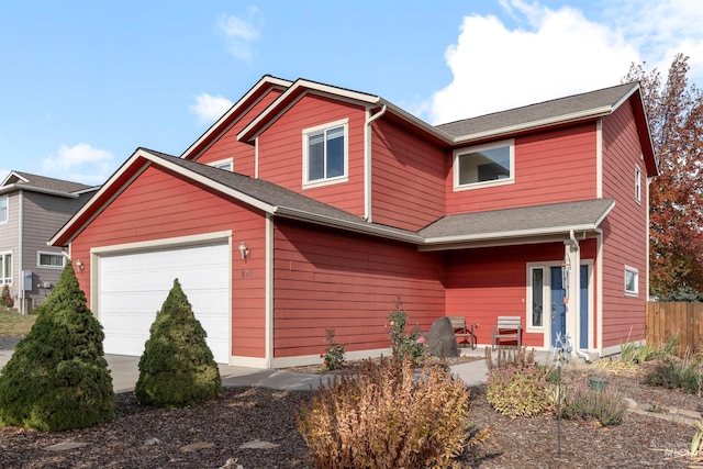 view of front of property featuring a garage