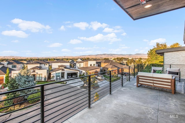 balcony featuring a mountain view